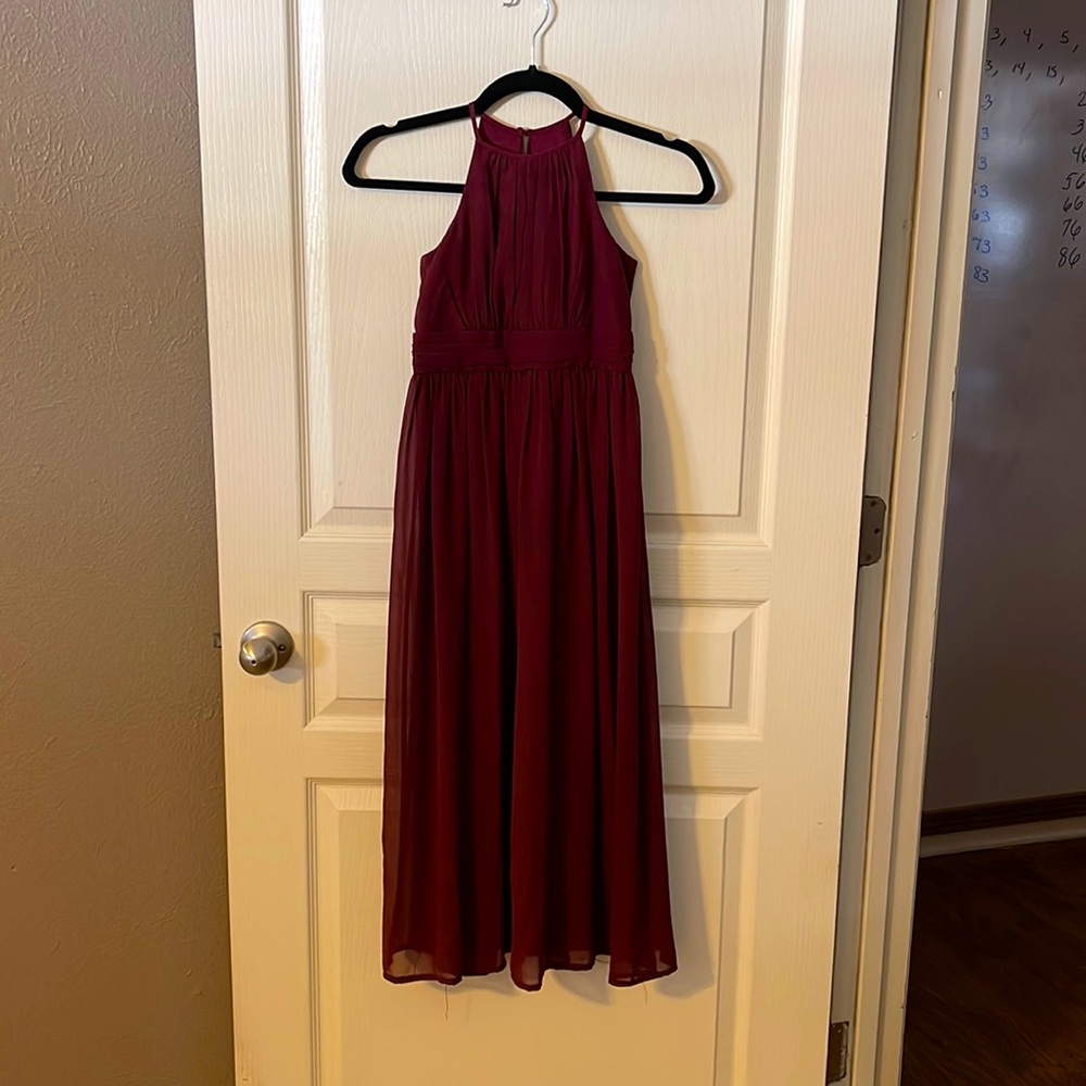 David’s bridal dress youth size 8 worn one time at a wedding. No flaws